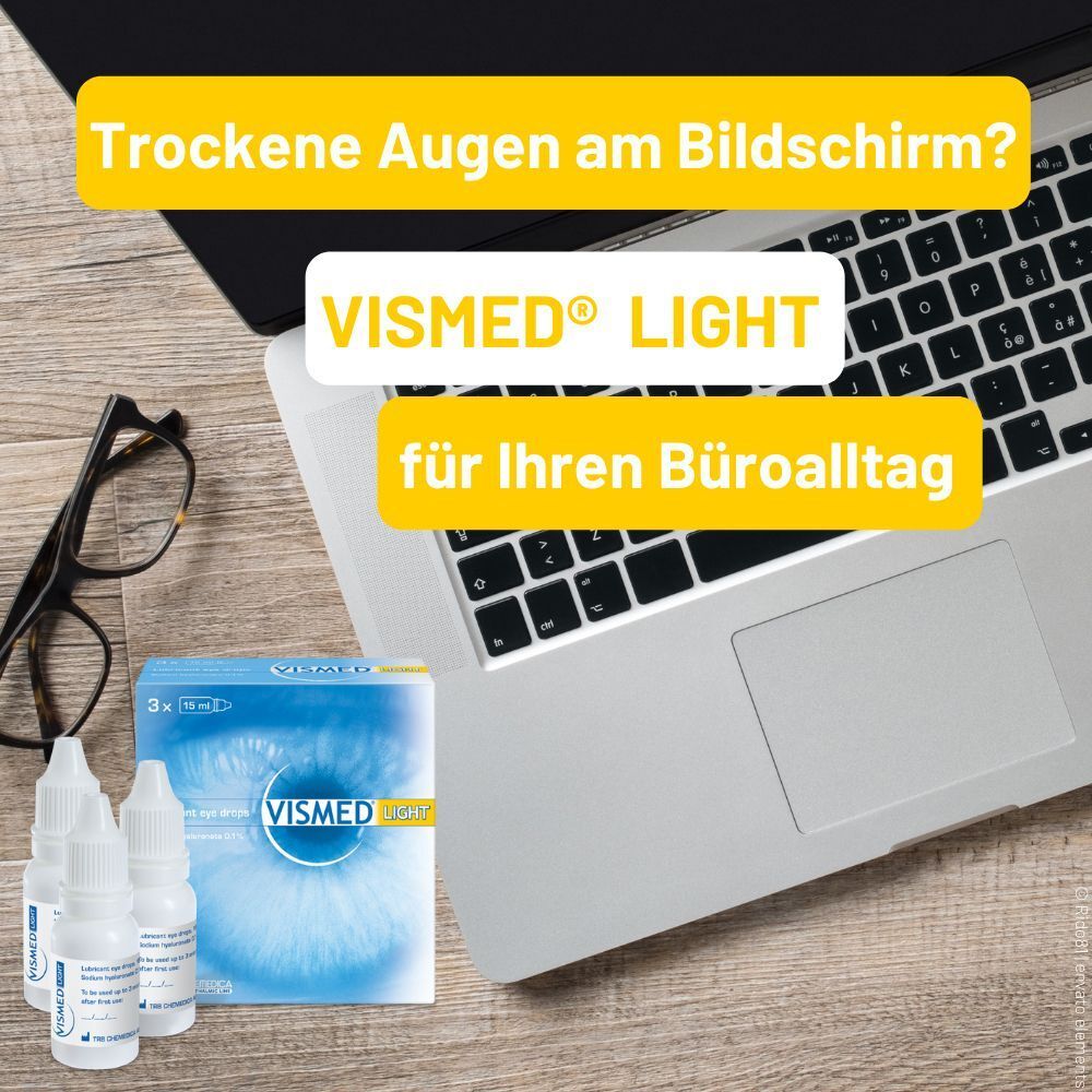 VISMED® LIGHT Augentropfen neben einem Laptop und einer Brille für den Büroalltag.