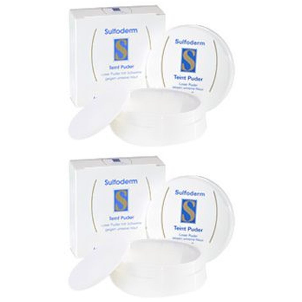 Zwei weiße Puderdosen und Kartons mit dem Logo Sulfoderm. Deckel und Puderbehälter sind sichtbar.