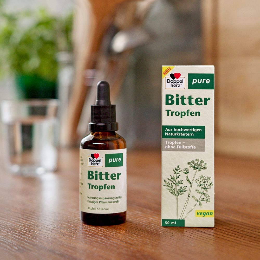 Flasche und Packung Doppelherz® pure Bitter Tropfen mit Pipette, 50 ml.