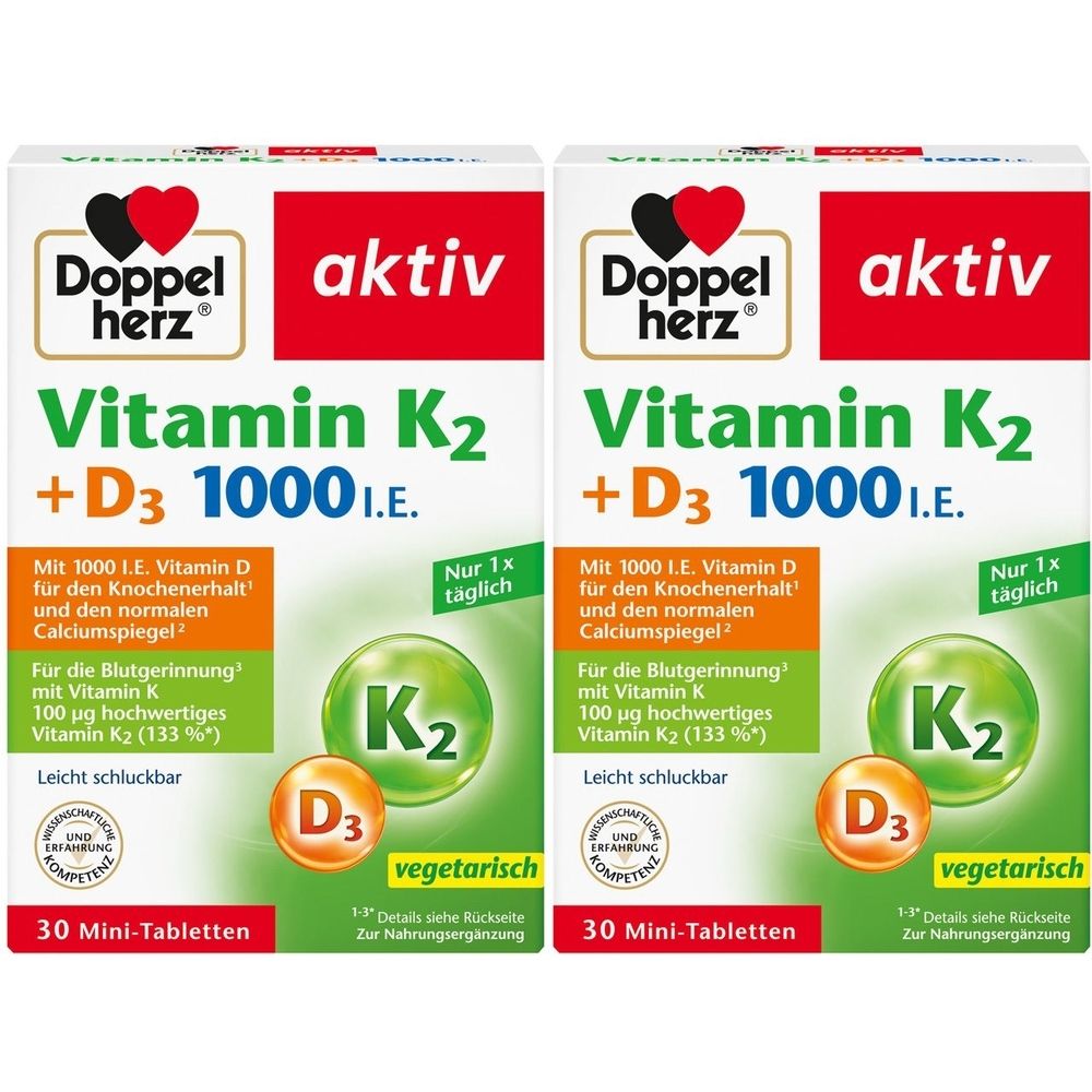Zwei Packungen Doppelherz aktiv Vitamin K2 + D3 1000 I.E. mit grüner, weißer und roter Schrift. 30 Mini-Tabletten, vegetarisch.