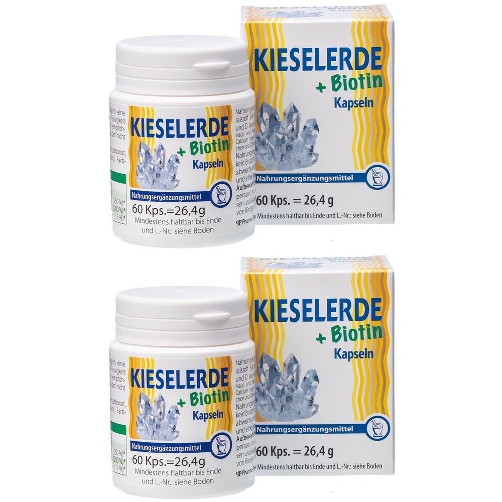 Zwei weiße Flaschen und Schachteln mit der Aufschrift Kieselerde + Biotin Kapseln. Aufschrift: 60 Kps. = 26,4 g. Nahrungsergänzungsmittel.