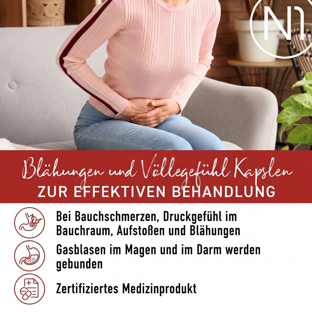 Frau mit Bauchschmerzen, die N1 Blähungen & Völlegefühl Kapseln zur Linderung einnimmt.