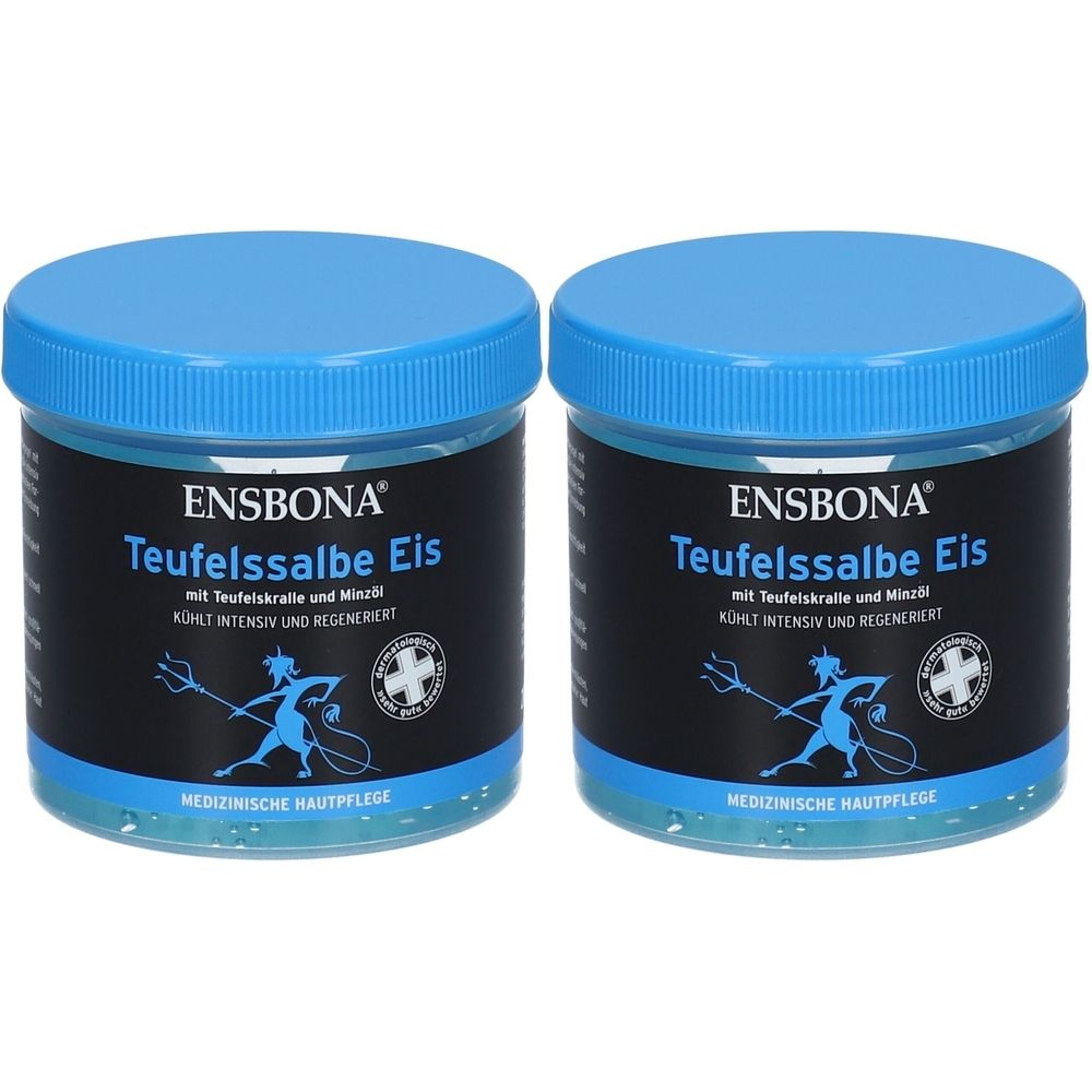 Zwei blaue Tiegel mit blauem Deckel. Aufschrift: ENSBONA Teufelssalbe Eis. Schwarzes Etikett mit Illustration und Text. Medizinische Hautpflege.