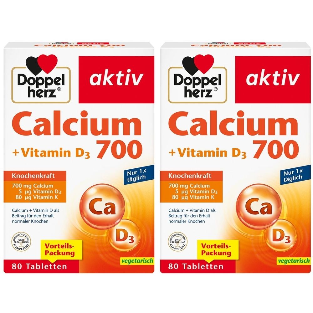 Zwei Packungen Doppelherz Calcium 700 + Vitamin D3. Weiße Schachteln mit roter und orangefarbener Schrift. Enthält 80 Tabletten.