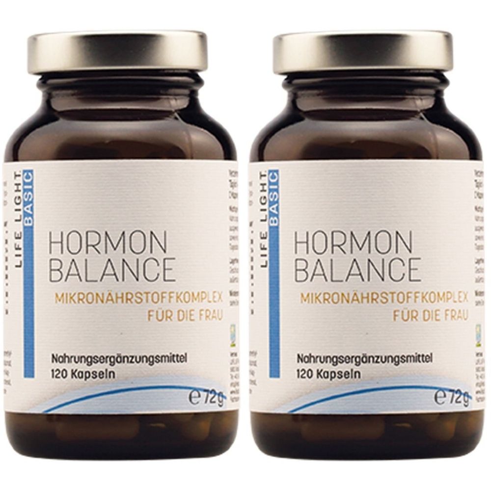 Zwei braune Glasflaschen mit silbernen Deckeln. Auf den Etiketten steht "HORMON BALANCE" und "Mikronährstoffkomplex für die Frau".