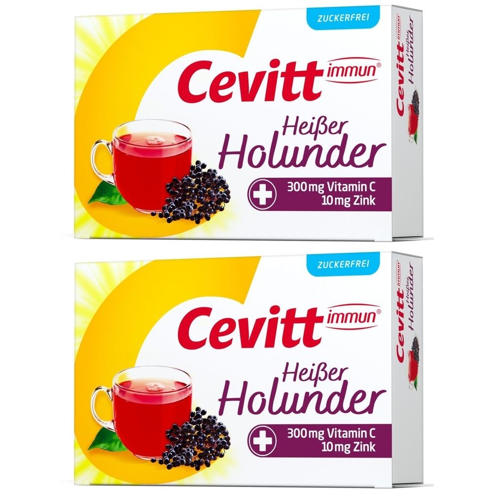 Zwei Packungen Cevitt immun Heißer Holunder zuckerfrei. Aufdruck: 300mg Vitamin C, 10mg Zink. Abbildung: Heißgetränk mit Holunderbeeren.