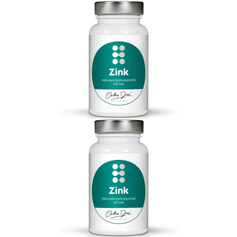 Zwei weiße Flaschen mit silbernen Deckeln. Auf jeder Flasche ein grünes Etikett mit der Aufschrift "Zink" und dem Logo von OrthoDoc®.
