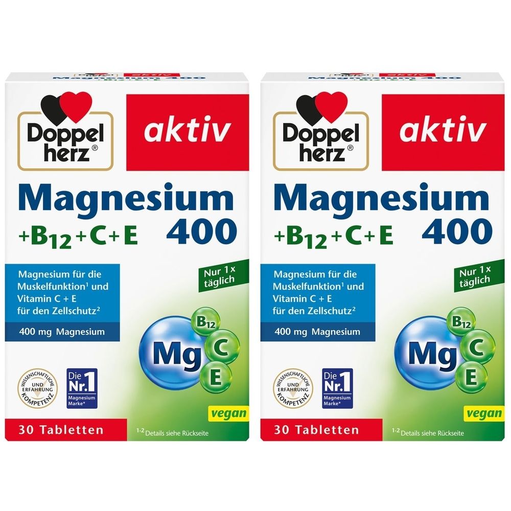 Zwei Packungen Doppelherz aktiv Magnesium 400 +B12+C+E. Weiße Schachteln mit roter und blauer Schrift. 30 Tabletten, vegan.