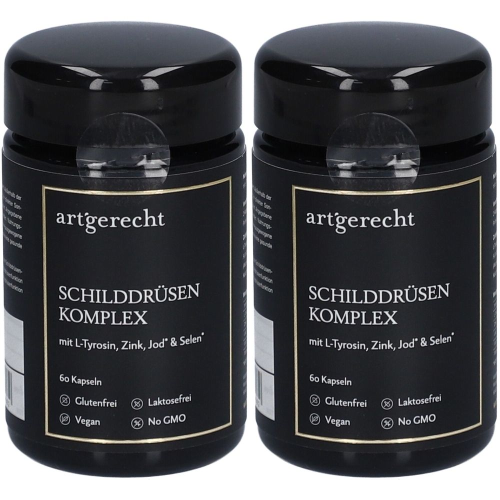 Zwei schwarze Dosen mit dem Etikett "artgerecht SCHILDDRÜSEN KOMPLEX". Aufschrift: L-Tyrosin, Zink, Jod & Selen. 60 Kapseln. Glutenfrei, Vegan, Laktosefrei, No GMO.
