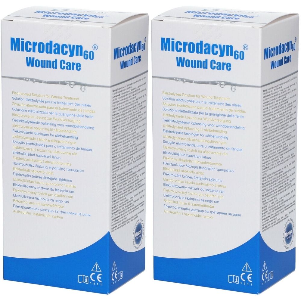 Zwei weiße Kartons mit blauer Schrift. Aufschrift: Microdacyn60 Wound Care. CE-Kennzeichnung.