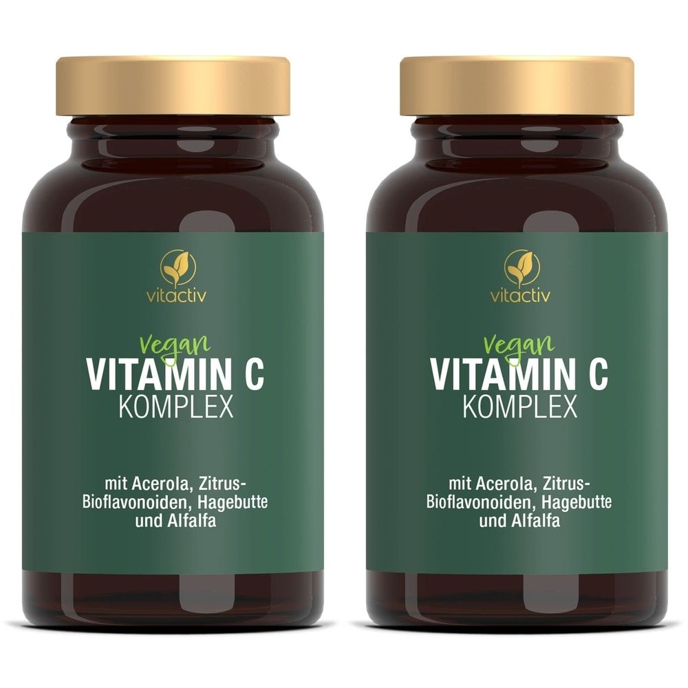Zwei braune Flaschen mit goldfarbenen Deckeln. Auf den grünen Etiketten steht: Vegan Vitamin C Komplex. Mit Acerola, Zitrus-Bioflavonoiden, Hagebutte und Alfalfa.