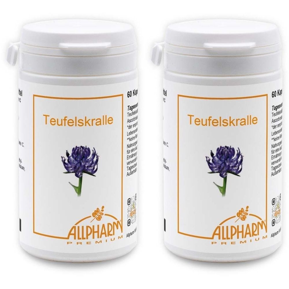 Zwei weiße Pillendosen mit Etikett. Aufschrift: Teufelskralle, Logo ALLPHARM PREMIUM. Abbildung einer Blume. Deckel mit Klappverschluss.