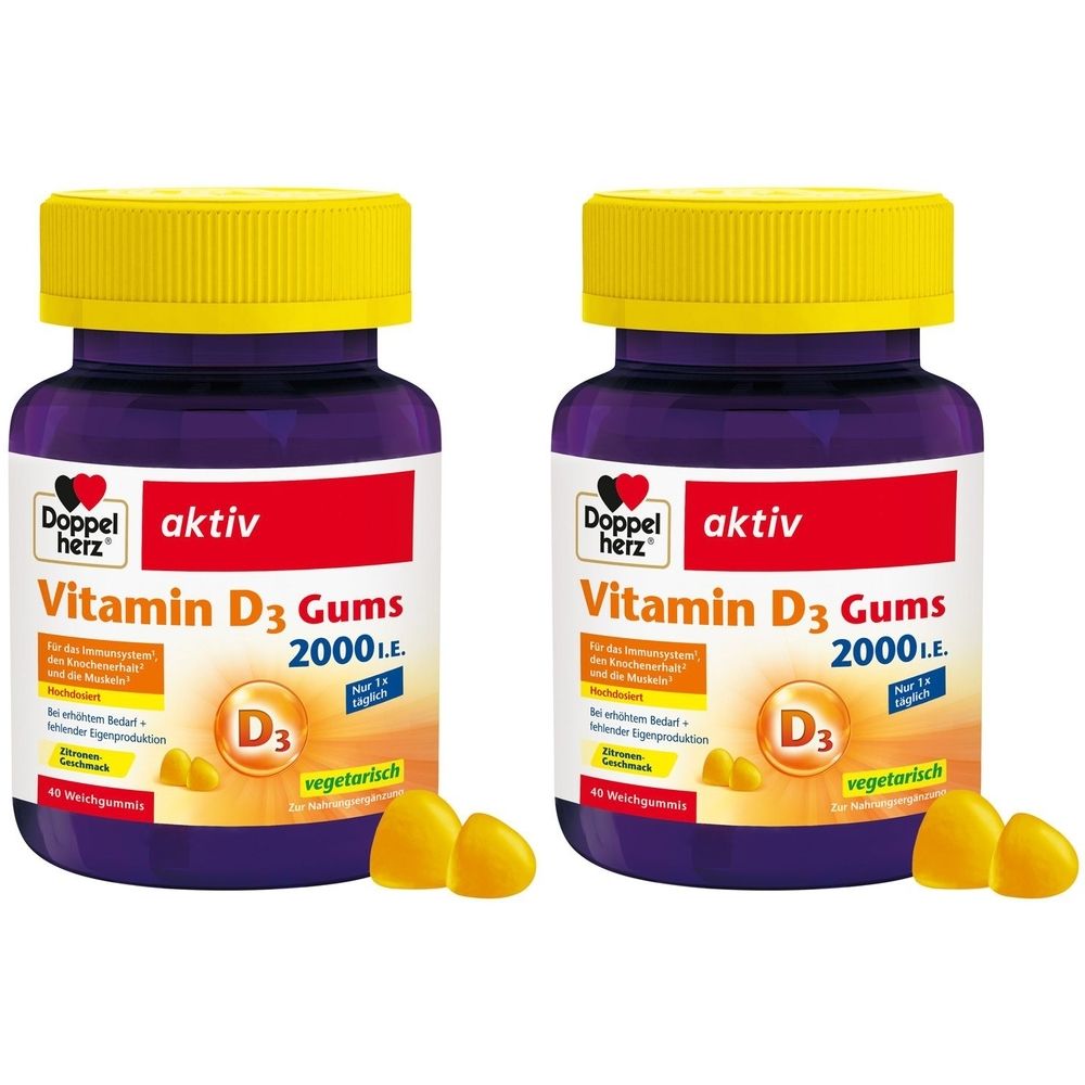 Zwei Flaschen mit gelben Deckeln und lila Körpern. Aufschrift: Doppelherz aktiv Vitamin D3 Gums 2000 I.E. Gelbe Gummibärchen liegen daneben.