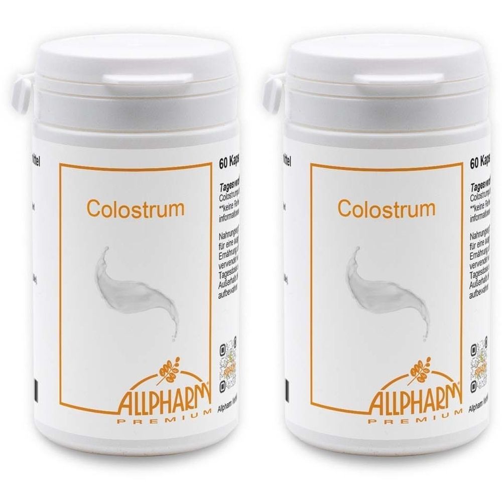 Zwei weiße Pillendosen mit dem Aufdruck "Colostrum" und dem Logo von "ALLPHARM". Aufschrift "60 Kapseln".
