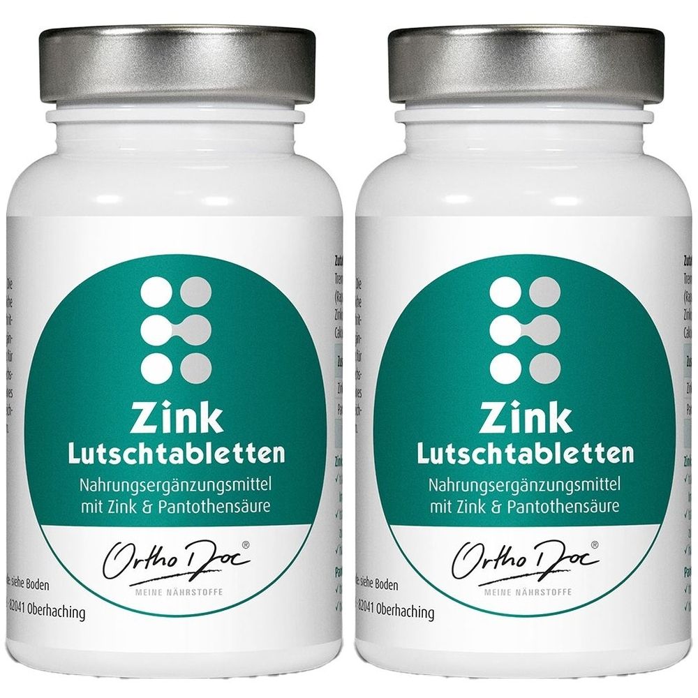Zwei weiße Flaschen mit silbernen Deckeln. Auf jeder Flasche ein grünes Etikett mit der Aufschrift "Zink Lutschtabletten" und dem Logo von Ortho Doc.