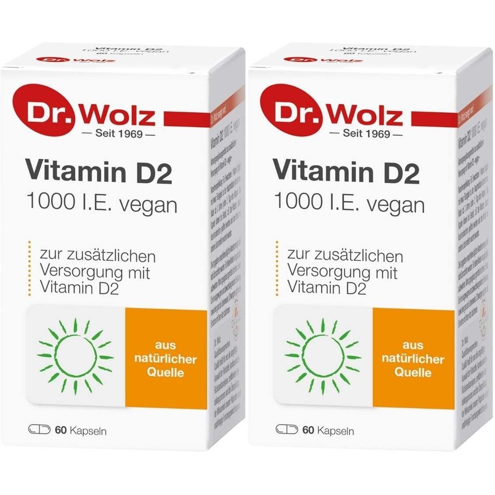 Zwei weiße Schachteln mit "Dr. Wolz Vitamin D2 1000". Aufschrift: "vegan", "aus natürlicher Quelle", 60 Kapseln.