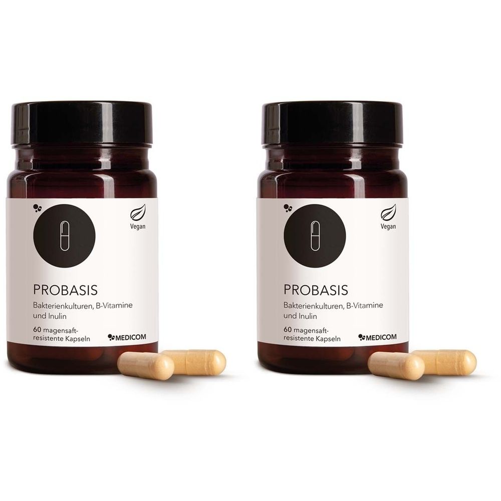 Zwei braune Flaschen mit schwarzen Deckeln. Aufschrift: PROBASIS, Bakterienkulturen, B-Vitamine und Inulin. Vegan-Siegel. Zwei Kapseln liegen daneben.