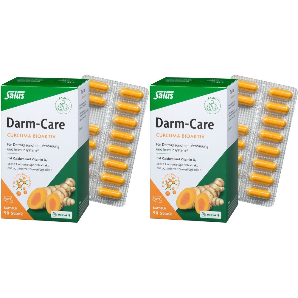 Zwei Schachteln und Blisterpackungen mit Kapseln. Auf den Schachteln steht "Salus Darm-Care Curcuma Bioaktiv".