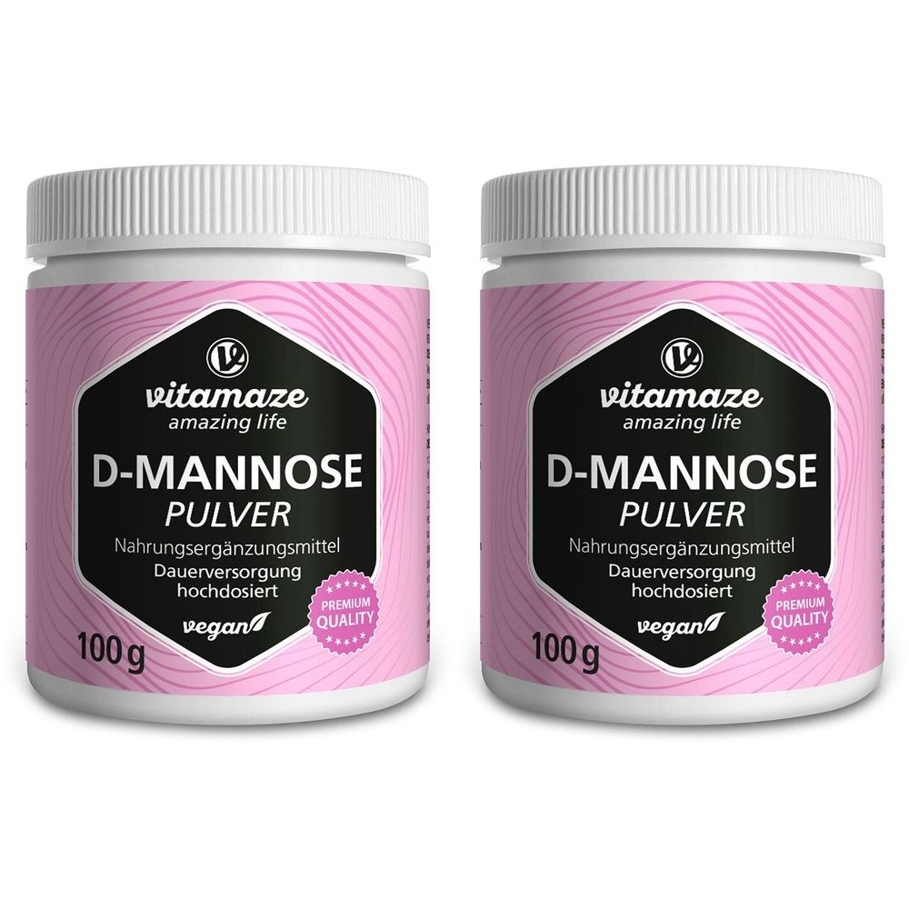 Zwei weiße Dosen mit rosa Etiketten. Aufschrift: D-Mannose Pulver, 100g, vegan, Premium Quality. Marke: Vitamaze.