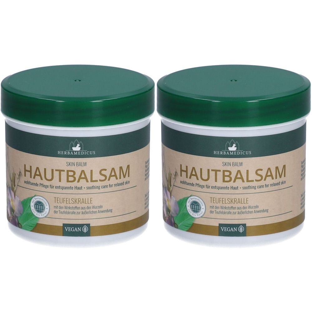 Zwei Tiegel Hautbalsam mit grünem Deckel. Aufschrift: HERBAMEDICUS, Hautbalsam Teufelskralle. Vegan-Siegel.