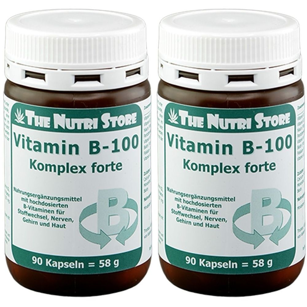 Zwei braune Flaschen mit weißem Deckel. Aufschrift: Vitamin B-100 Komplex forte. Enthält 90 Kapseln. Marke: The Nutri Store.