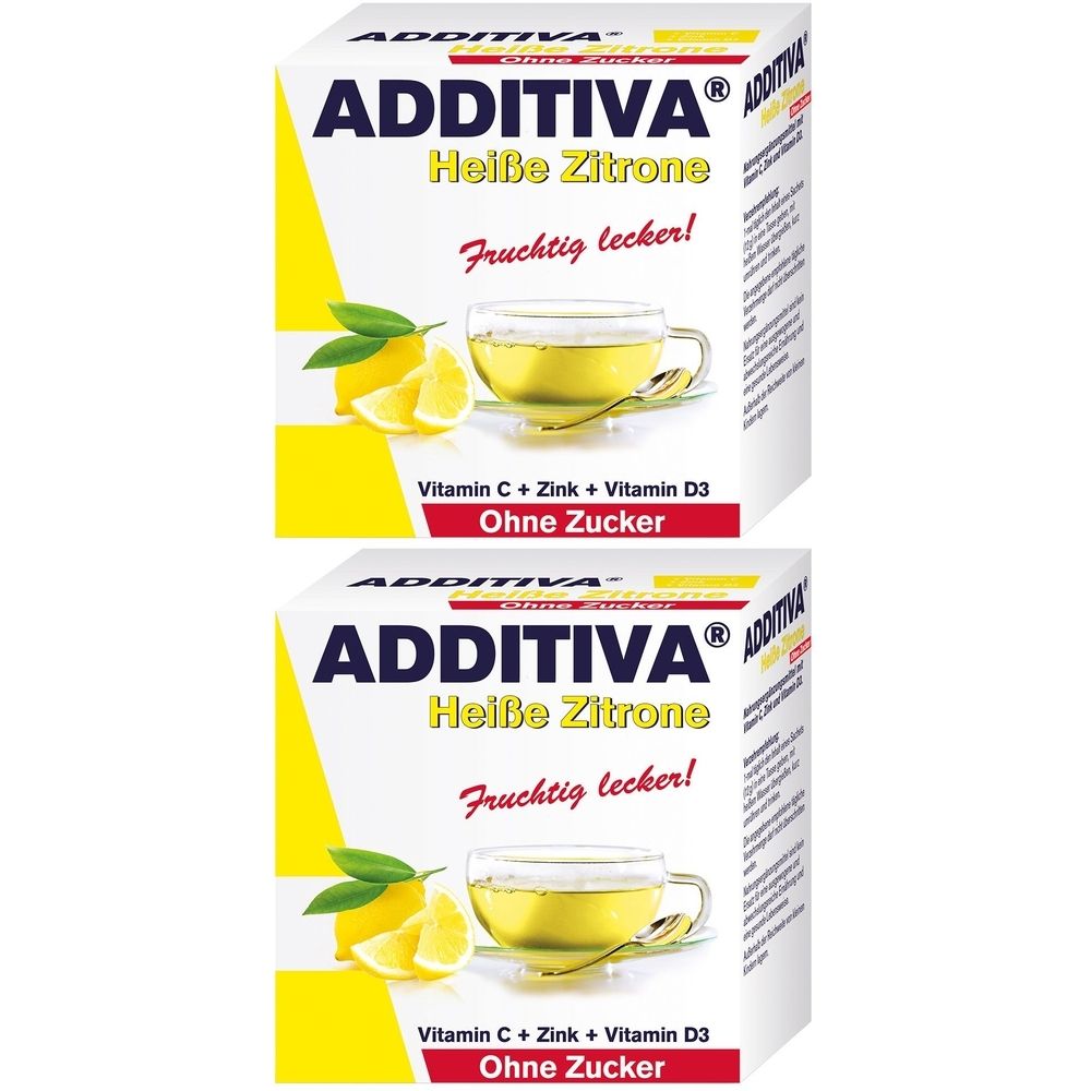 Zwei Packungen ADDITIVA Heiße Zitrone ohne Zucker. Aufdruck: Vitamin C, Zink, Vitamin D3. Abbildung: Zitrone, Tasse Tee.