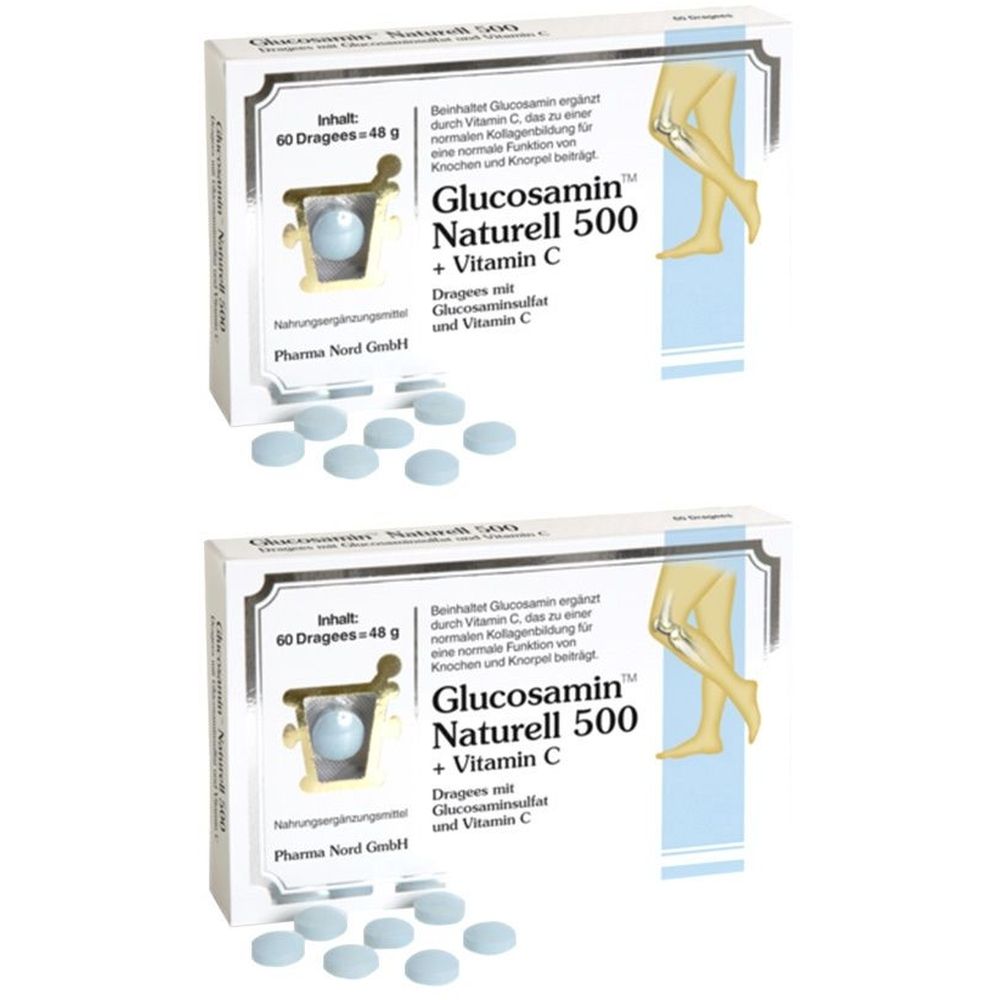 Zwei Schachteln mit Tabletten. Aufschrift: Glucosamin Naturell 500 + Vitamin C. Blaue Tabletten liegen vor den Schachteln.