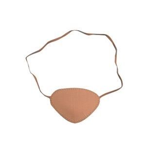 Augenklappe in Sandfarbe mit Band. Dreieckige Form, genäht. Für ein Auge.