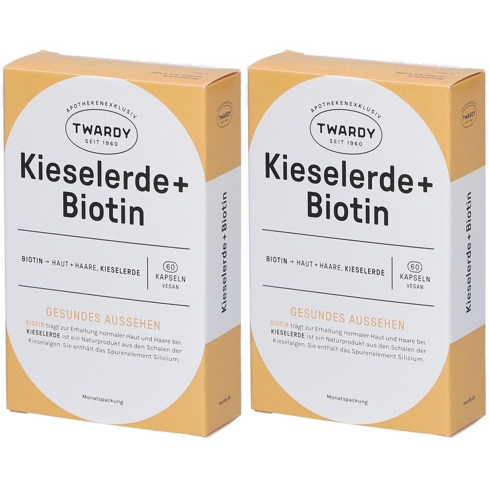 Zwei Kartons Kieselerde+Biotin. Aufschrift: Twardy, Kieselerde+Biotin, 60 Kapseln, vegan. Gelbe Verpackung mit weißem Label.