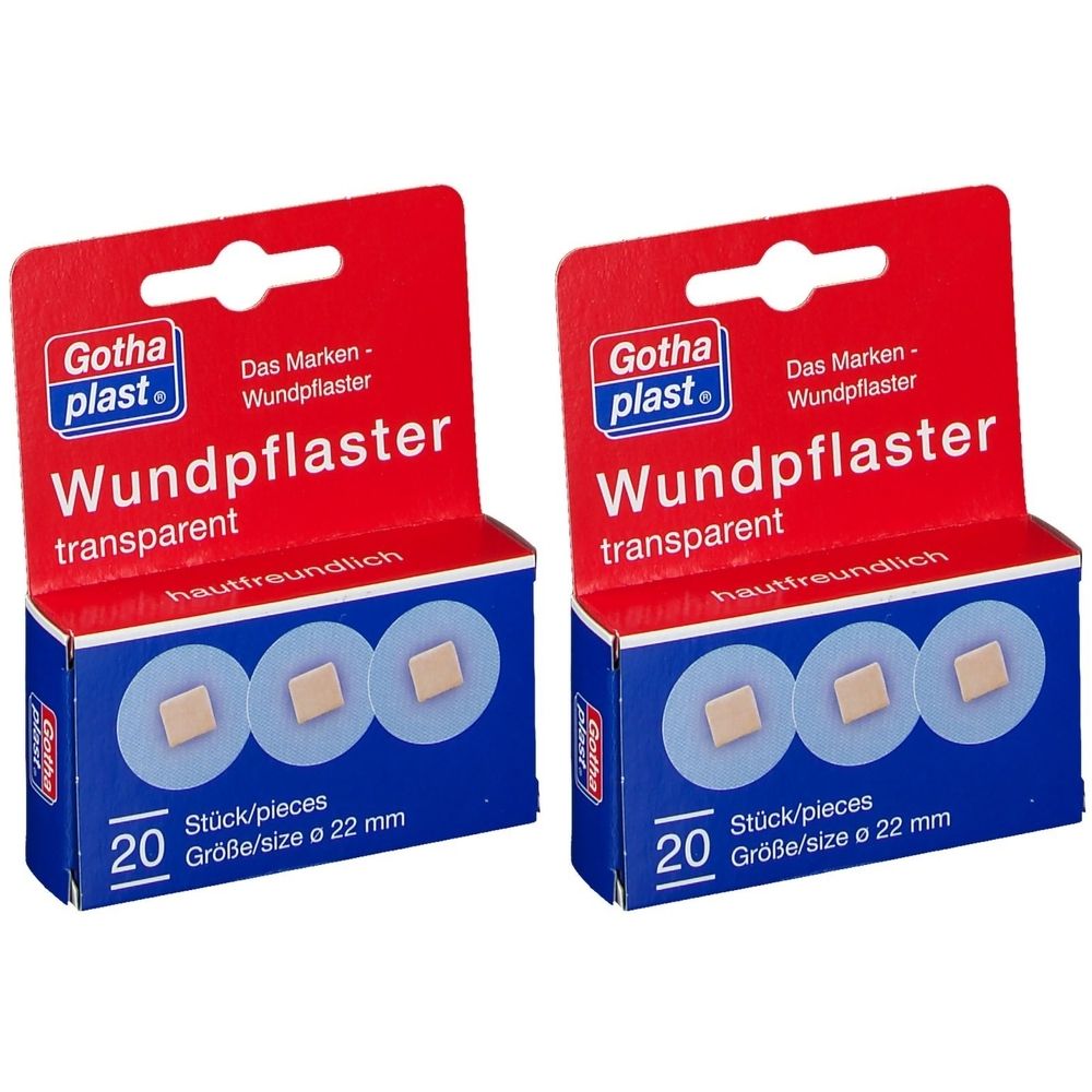 Zwei Packungen Wundpflaster. Rote Verpackung mit blauem Boden. Aufschrift: Gothaplast, Wundpflaster, transparent, 20 Stück, Größe 22 mm.