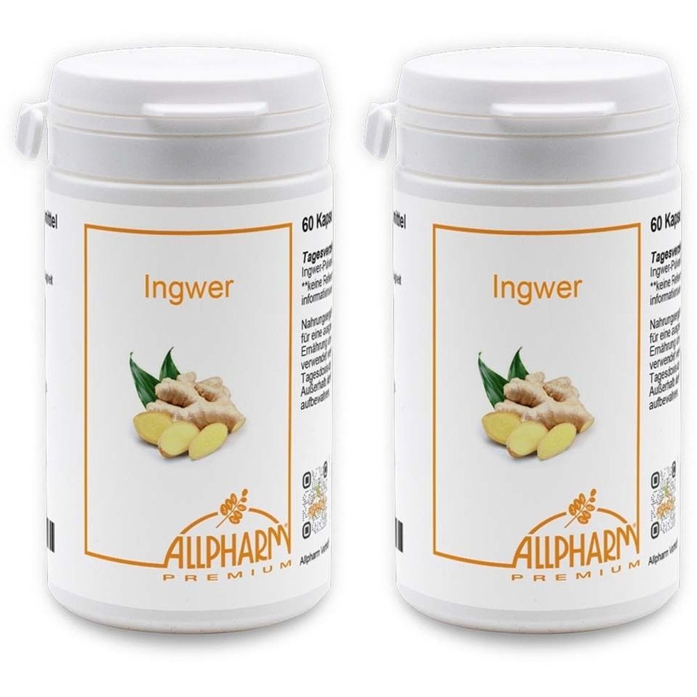 Zwei weiße Pillendosen mit Ingwer-Etikett. Aufschrift "Ingwer" und Logo "ALLPHARM PREMIUM". Abbildung von Ingwerwurzeln und Blättern.