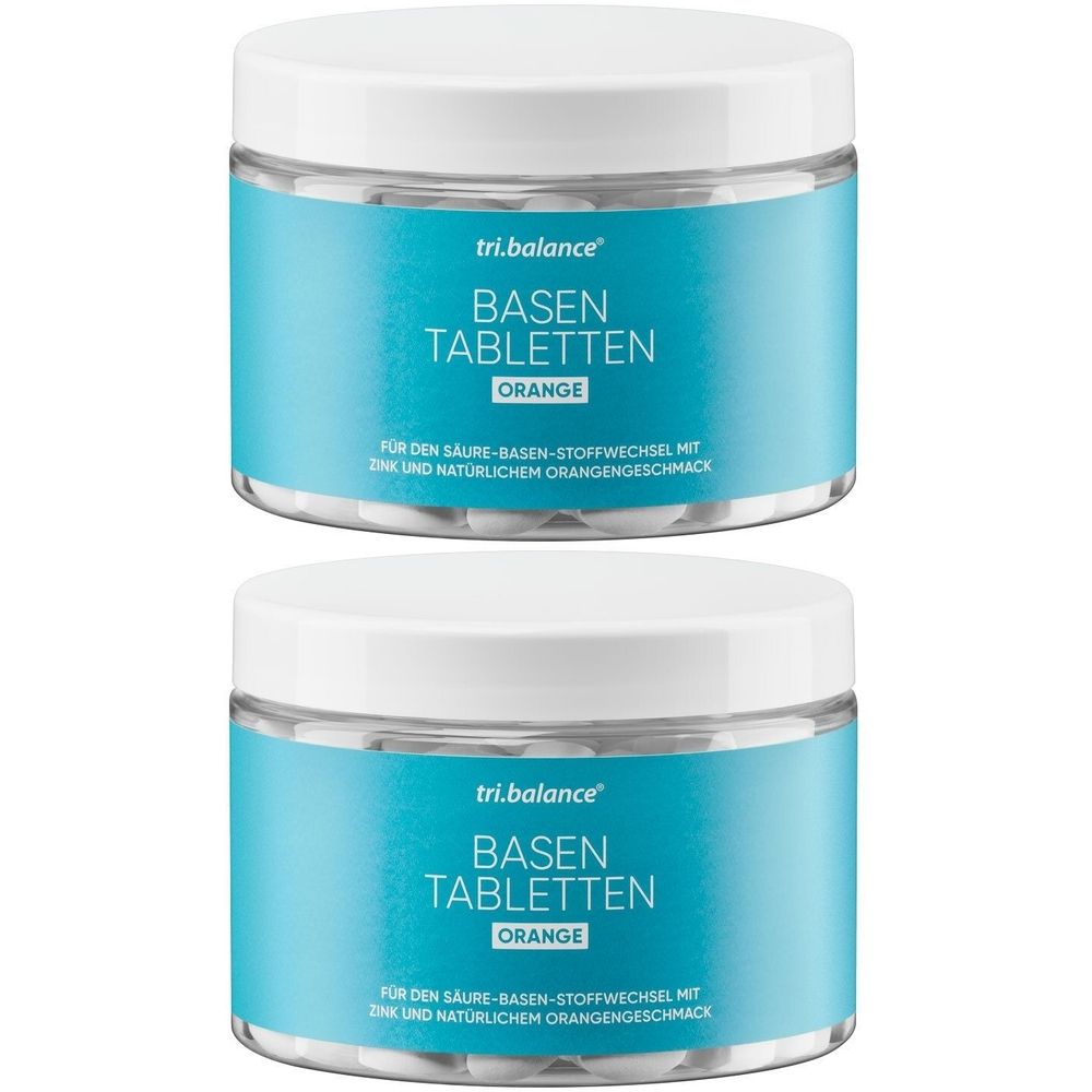 Zwei Dosen tri.balance Basentabletten Orange. Blaue Etiketten mit weißer Schrift. Deckel weiß. Tabletten sichtbar.