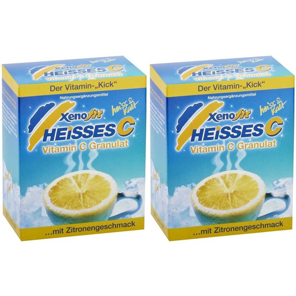 Zwei Kartons Xenofit HEISSES C Granulat. Blaue Verpackung mit Zitrone und Schriftzug. Enthält Vitamin C.