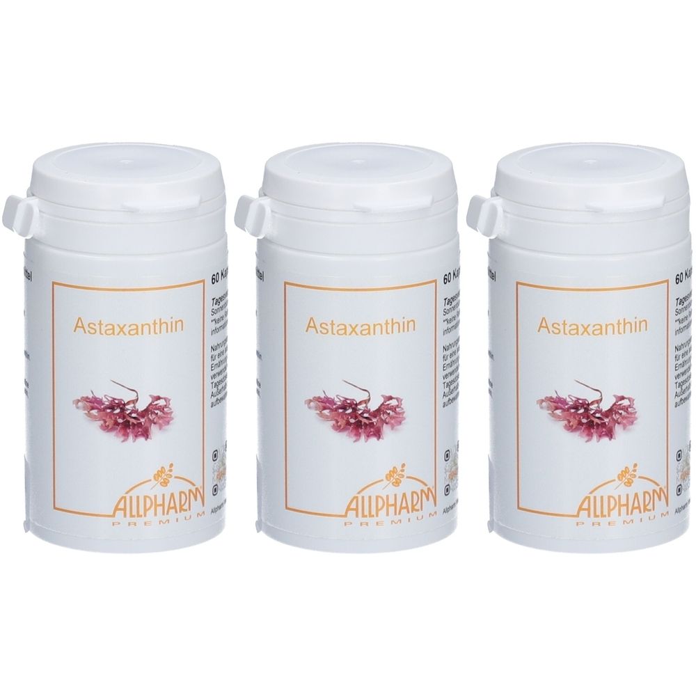 Drei weiße Pillendosen mit Deckel. Auf jeder Dose steht "Astaxanthin" und "ALLPHARM".