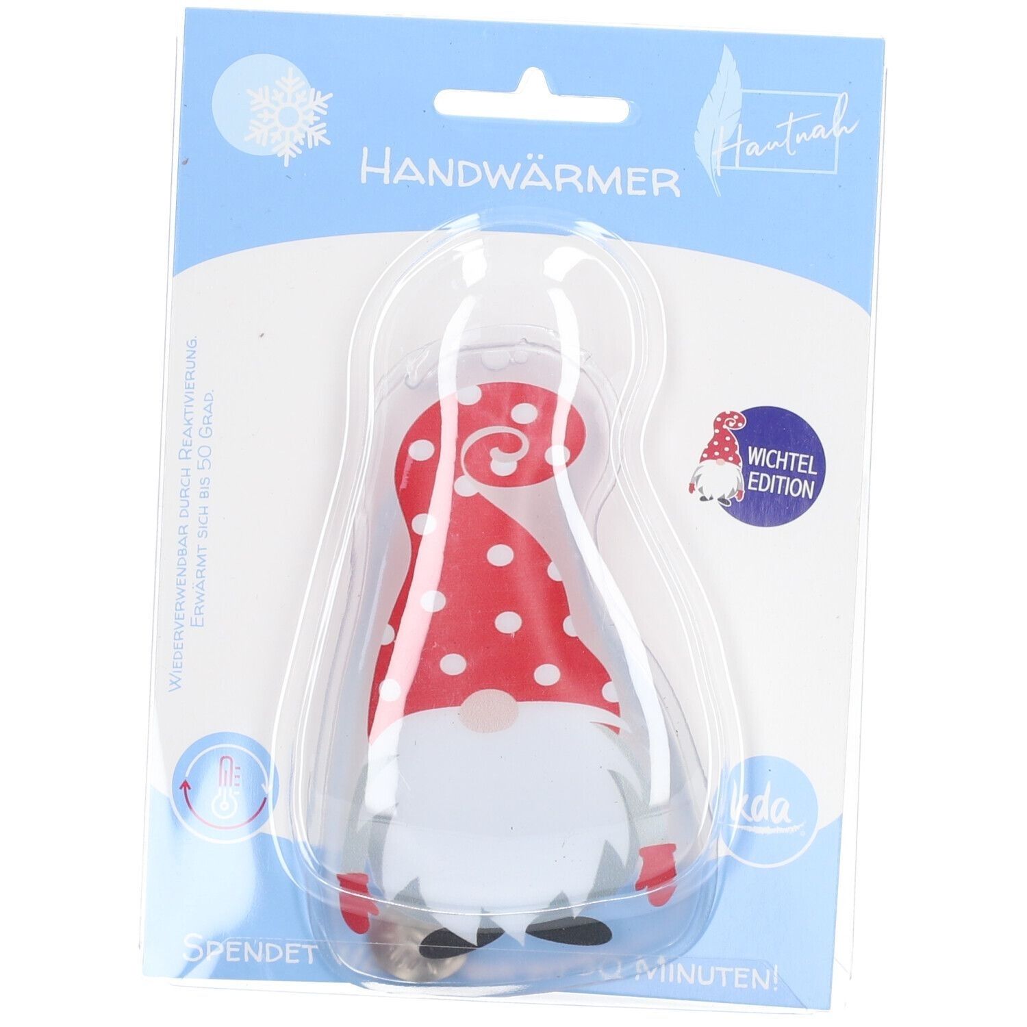 Handwärmer in Zwergform, rot-weiß gepunktet. In Blisterverpackung. Aufschrift: Handwärmer, Wichtel Edition, Hautnah.