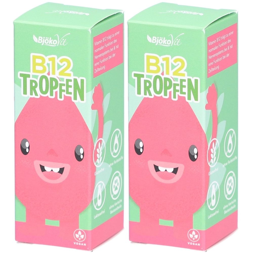 Zwei grüne Kartons mit "B12 Tropfen"-Aufdruck. Auf den Kartons ist ein rosa Cartoon-Gesicht abgebildet. Vegan-Siegel.