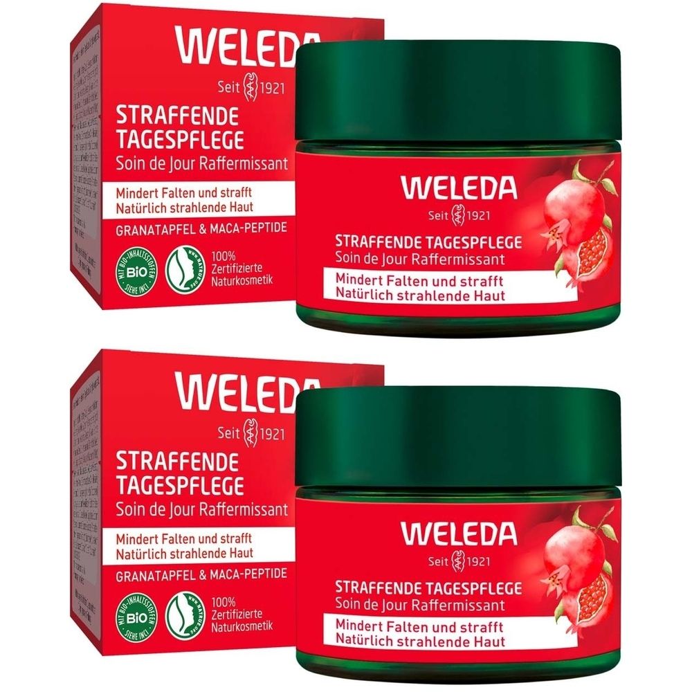 Zwei Tiegel und zwei Schachteln Weleda Straffende Tagespflege. Rote Verpackung mit Produktnamen und Granatapfel-Abbildung.