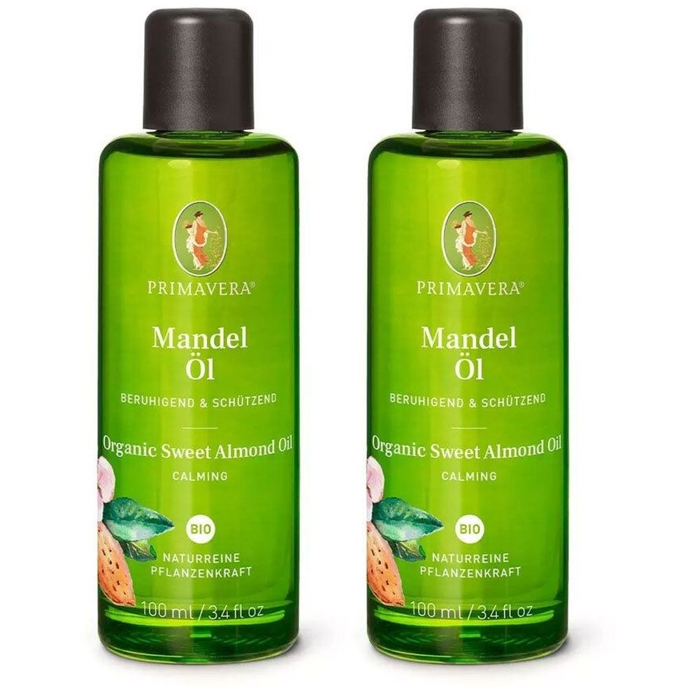 Zwei grüne Flaschen mit braunen Deckeln. Aufschrift: PRIMAVERA Mandel Öl. Text: Beruhigend & schützend, Organic Sweet Almond Oil, BIO. 100 ml.