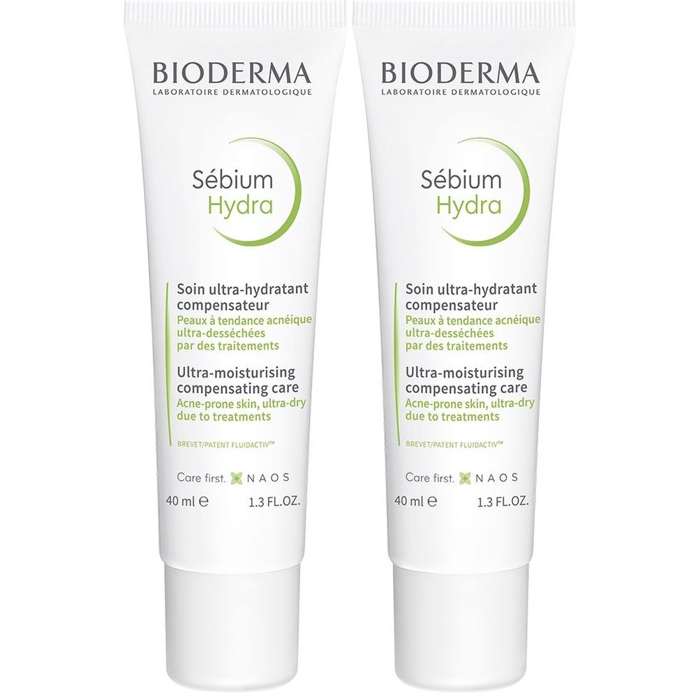 Zwei Tuben BIODERMA Sébium Hydra. Weiße Tuben mit grüner Schrift. Text: Ultra-Feuchtigkeitscreme für Akne-Haut.
