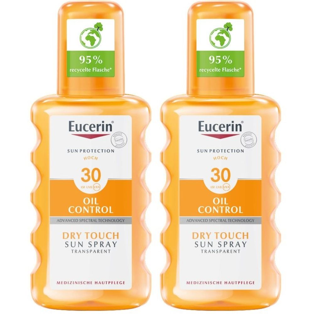 Zwei orangefarbene Sonnenschutzsprays. Aufschrift: Eucerin, Sun Protection 30, Oil Control, Dry Touch Sun Spray Transparent. 95% recycelte Flasche.