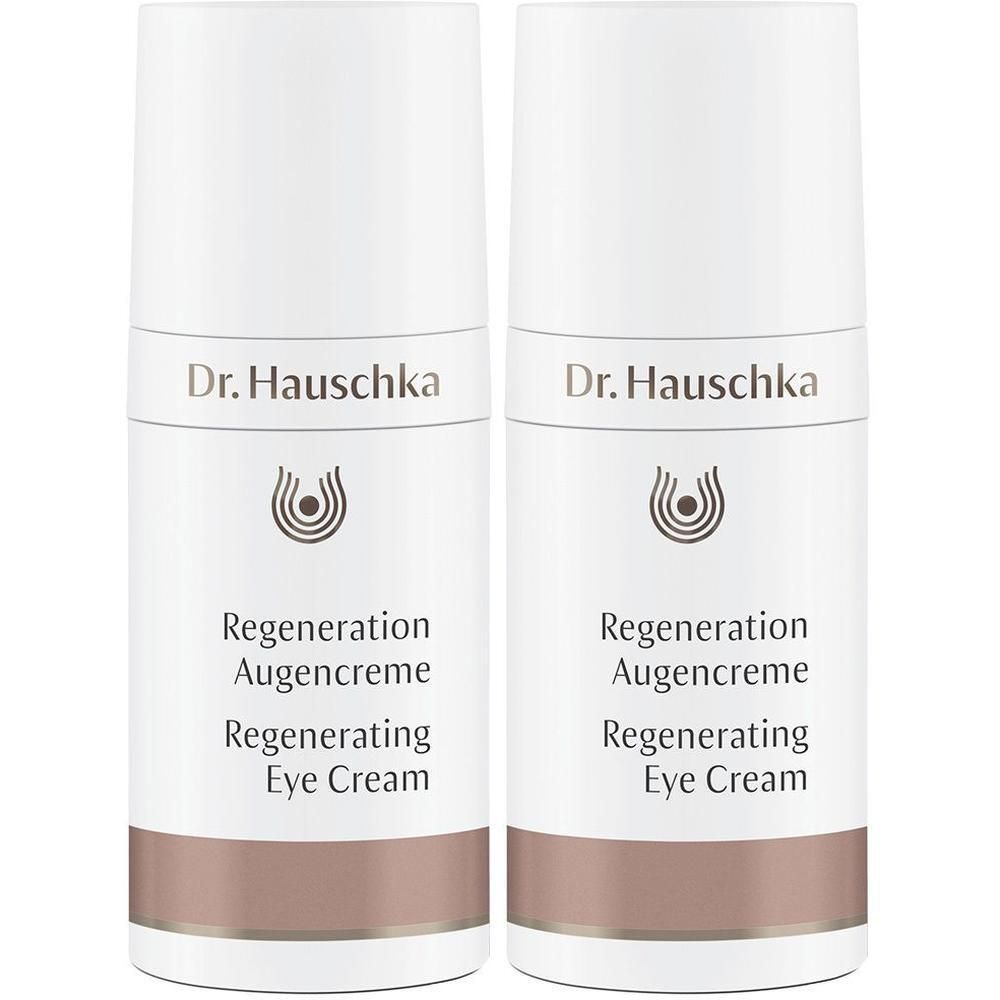 Zwei Dr. Hauschka Regeneration Augencreme Flaschen mit weißem und braunem Etikett.