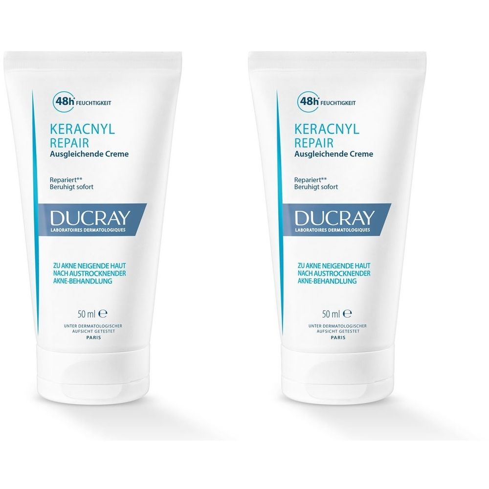 Zwei weiße Tuben DUCRAY KERACNYL REPAIR Creme. Blaue Schriftzüge: KERACNYL REPAIR, Ausgleichende Creme, 50 ml.