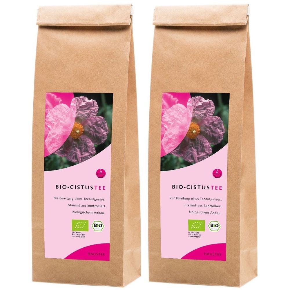 Zwei braune Papiertüten mit pinkfarbenen Etiketten. Auf den Etiketten: BIO-CISTUSTEE, eine Blume und Bio-Siegel.