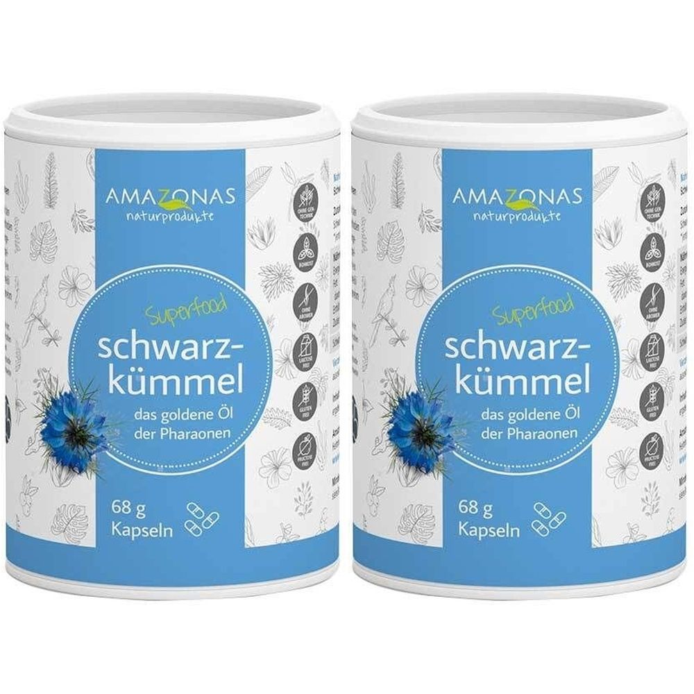 Zwei zylindrische Dosen mit blau-weißem Etikett. Aufschrift: AMAZONAS, Superfood, Schwarzkümmel, 68 g Kapseln. Abbildung einer Blume.