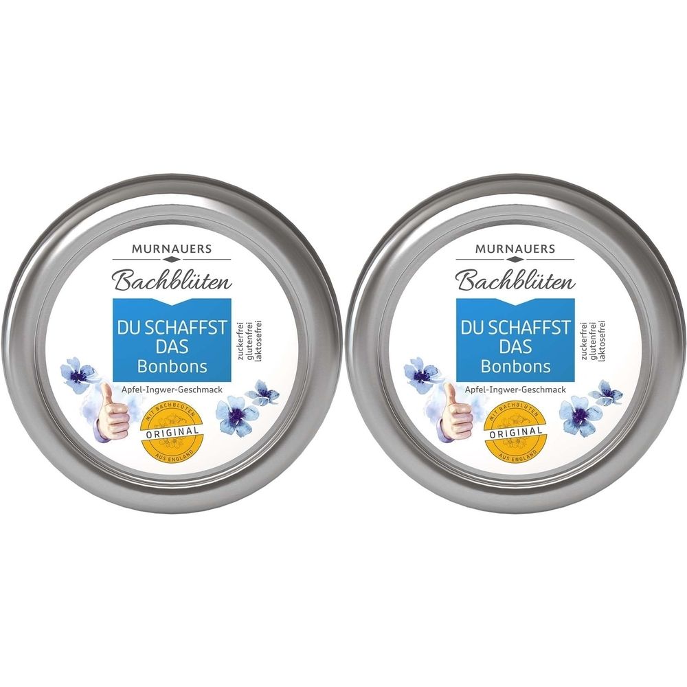 Zwei runde Dosen mit Aufschrift "Bachblüten Bonbons". Silberne Deckel, weiße Etiketten mit Text und floralen Motiven.