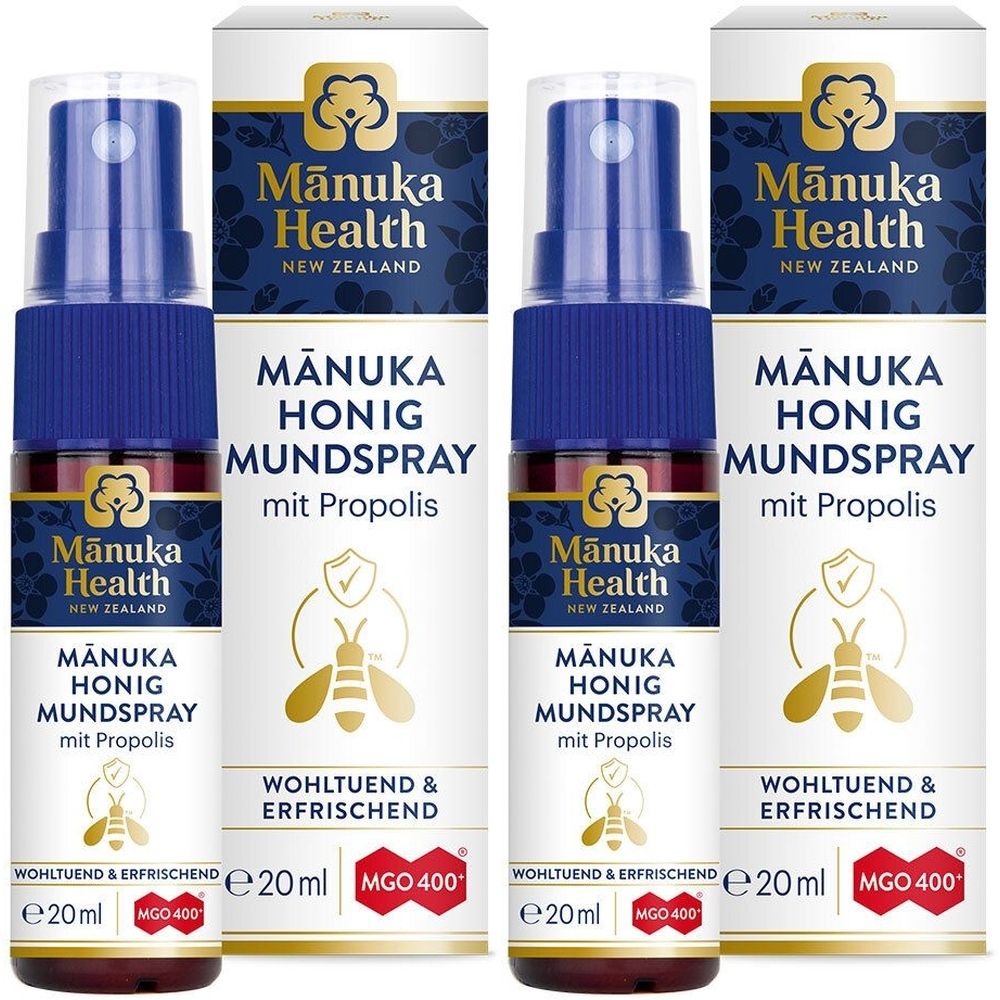 Mehrere Sprays mit blauen Kappen und weißen Verpackungen. Aufschrift: Mānuka Honig Mundspray mit Propolis. MGO 400.