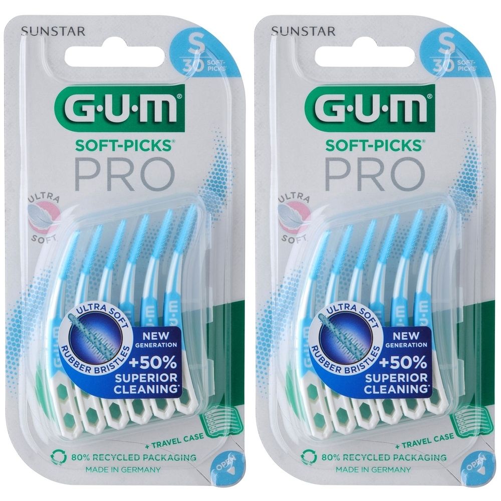 Zwei Packungen GUM Soft-Picks Pro. Blaue Interdentalbürsten mit weißen Griffen in Plastikverpackung. Text: Ultra Soft, +50% Superior Cleaning.