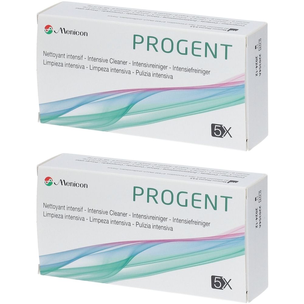 Zwei Schachteln PROGENT Intensivreiniger. Aufschrift: Menicon, PROGENT, 5X. Mehrsprachige Produktbezeichnungen.