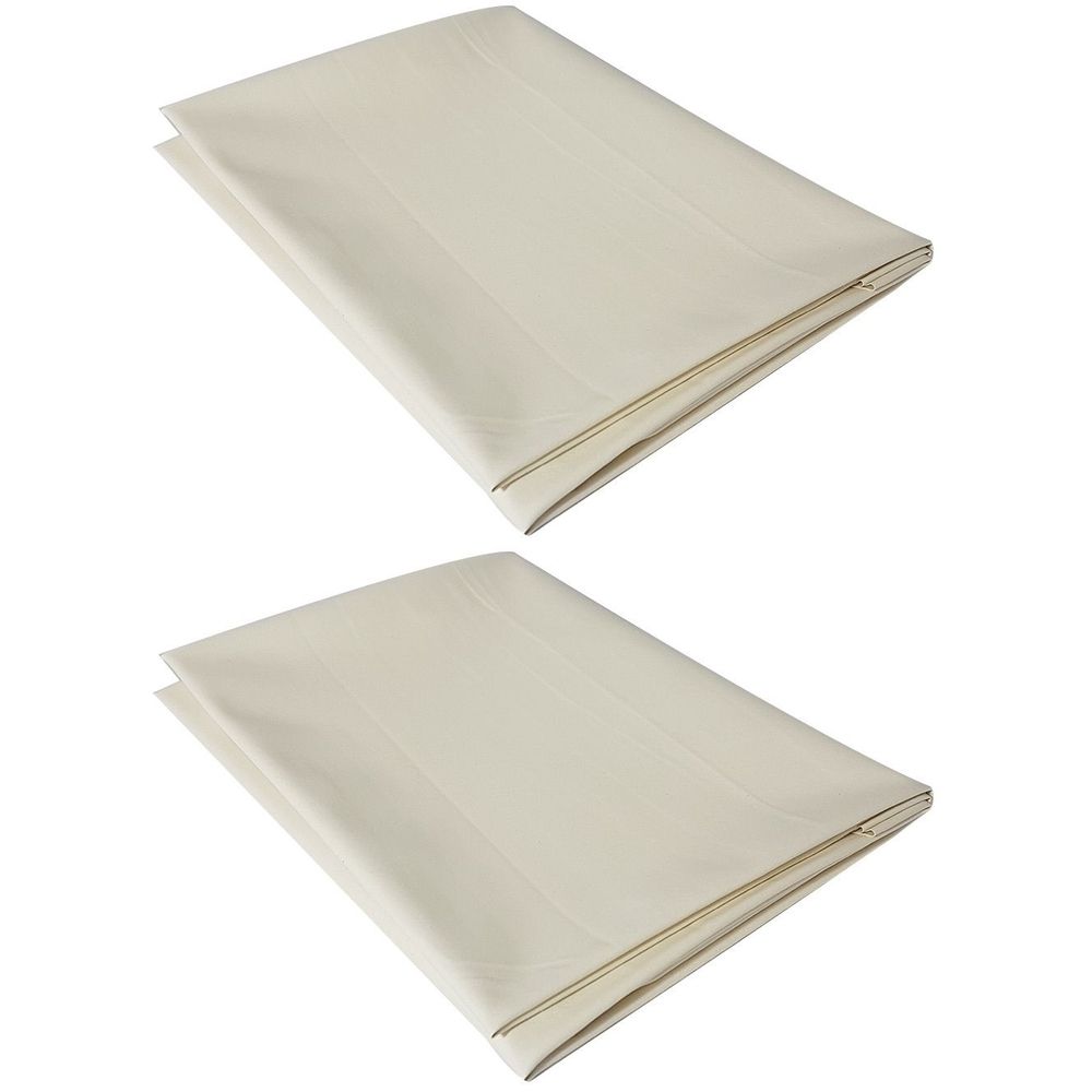 Zwei cremefarbene, rechteckige Bettschutzeinlagen, gefaltet. Die Oberflächen sind glatt und ohne erkennbare Merkmale.