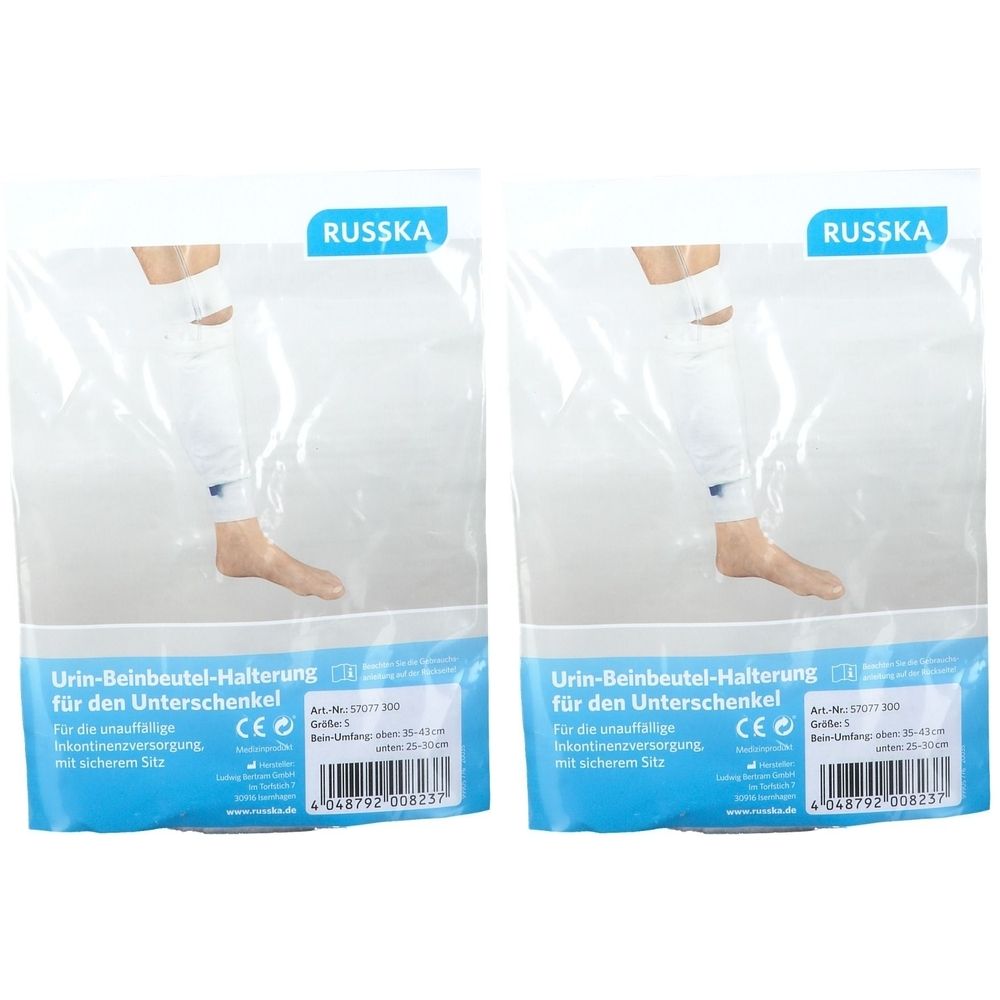 Zwei transparente Beutel mit Beinbeutelhalterung. Aufdruck: RUSSKA, Urin-Beinbeutel-Halterung für den Unterschenkel, Größe S.